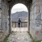 Montsegur, Aringe, France: 2020 from December 20: Men in Cathar castle of Montsegur in Ariege, Occitanie in south of France in winter 2020