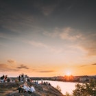 Stockholm, Sweden - June 29, 2019: Young People Resting In Skinnarviksberget Mountain Party Place During Summer Sunset. Popular Place.