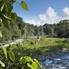 Starting from a high point in the jungle canopy a tourist zips over the Sarapiqui River in Costa Rica.  Zip lining has become one of the most popular tourist activities in Costa Rica.
904577310
kwneeded
Costa Rica, Zip Line, Sarapiqui River, - stock photo
Starting from a high point in the jungle canopy a tourist zips over the Sarapiqui River in Costa Rica. Zip lining has become one of the most popular tourist activities in Costa Rica.