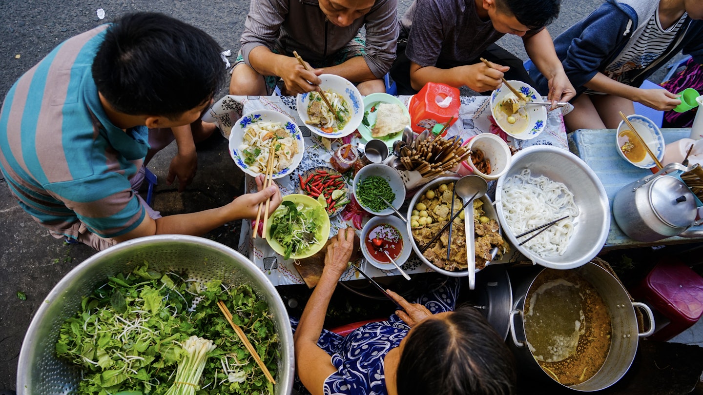 Street food, Ho Chi Minh City (Saigon)
ARCHIVE,  Adult,  Boy,  Child,  Eating,  Female,  Food,  Male,  Man,  Person,  Woman
Street food, Ho Chi Minh City (Saigon)