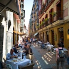 Bilbao, Spain-May 20, 2018: Old town of Bilbao with people havin License Type: media Download Time: 2023-04-01T16:29:39.000Z User: kparker52331 Is Editorial: Yes purchase_order: