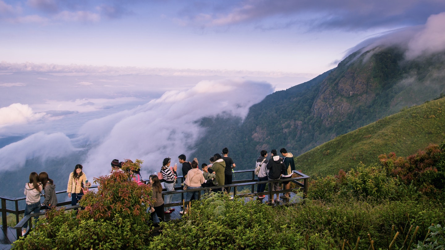CHIANGMAI , THAILAND â€“ NOVEMBER 26, 2016 : Tourists are watching beauty of nature on mountain, Location's Giew mae pan nature trail Doi Inthanon nation park Chomthong District, Chiang Mai of Thailand  License Type: media  Download Time: 2021-09-07T17:35:38.000Z  User: zachary.laks_lonelyplanet  Is Editorial: Yes  purchase_order:
Adventure,  Bag,  Handbag,  Hiking,  Mountain,  Mountain Range,  Nature,  Outdoors,  Person,  Scenery
Tourists are watching beauty of nature on mountain, Location's Giew mae pan nature trail Doi Inthanon nation park Chomthong District, Chiang Mai of Thailand