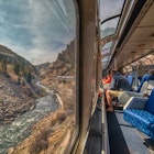 Denver, Colorado, USA 9-21-20 Amtrak Train crossing through the Colorado Rocky Mountains with peak Fall Colors in September  License Type: media  Download Time: 2023-02-08T19:07:32.000Z  User: bhealy950  Is Editorial: Yes  purchase_order:   