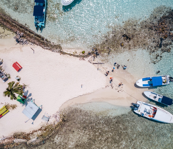 Aerial photo of tour boats anchored off South Silk Caye in the Gladden Spit and Silk Cayes Marine Reserve in Belize on March 12, 2023, License Type: media, Download Time: 2025-01-27T19:51:40.000Z, User: Ppeterson948, Editorial: true, purchase_order: 56530 - Guidebooks, job: Global Publishing WIP, client: Global Publishing WIP, other: Pia Peterson Haggarty