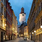 Stockholm, Sweden - August 25 2023: View of the Church of St. Nicholas, the oldest church in the Gamla Stan old town of central Stockholm, Sweden, seen illuminated through a street of shops at night.; Shutterstock ID 2351464949; purchase_order: 65050; job: Lonely Planet Online Editorial; client: Things to do in Stockholm; other: Brian Healy
2351464949
alley, architecture, beautiful, blue hour, building, cathedral, church, clock, clock tower, colors, dusk, europe, evening, gamla, gamla stan, gothic, illuminated, landmark, lights, medieval, narrow, night, old town, oldest, saint nicholas, scandinavia, shops, sky, st. nicholas, stan, stockholm, street, sunset, sweden, swedish, tourism, tower, town, travel, twilight, view
View of the Church of St. Nicholas, the oldest church in the Gamla Stan old town of central Stockholm, Sweden, seen illuminated through a street of shops at night