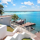 Houses and pier on the shore of the lagoon of Bacalar, Quintana Roo, Mexico, License Type: media, Download Time: 2025-01-30T21:29:45.000Z, User: Ppeterson948, Editorial: false, purchase_order: 56530 - Guidebooks, job: Global Publishing WIP , client: Global Publishing WIP , other: Pia Peterson Haggarty