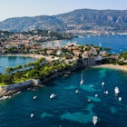 Aerial drone view of Saint-Jean-Cap-Ferrat, French Riviera (Côte d'Azur), France. Birds Eye view of the French Riviera resort town on Cap Ferrat cape with exclusive estates in a perched village., License Type: media, Download Time: 2025-02-26T18:30:24.000Z, User: katelyn.perry_lonelyplanet, Editorial: false, purchase_order: 65050 - Digital Destinations and Articles, job: wip, client: wip, other: katelyn perry