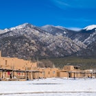 Taos Pueblo New Mexico the land of Enchantment and home to the Southern Sangre De Cristo Mountains of the desert Southwest native indigenous Americans, License Type: media_digital, Download Time: 2024-11-04T18:31:04.000Z, User: clairenaylor, Editorial: false, purchase_order: 65050 - Digital Destinations and Articles, job: Online editorial, client: Winter USA destinations, other: Claire Naylor