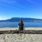 A from behind view of a beautiful young woman sitting on a log on the beach on a beautiful sunny day, deep in thought staring out at the ocean and mountains in Vancouver, British Columbia, Canada.
1151069150
admiring, background, bay, beautiful, blue sky, coast, contemplating, deep in thought, female, from behind, girl, landscape, mountains, ocean, outdoor, person, perspective, pretty, thinking, vancouver, view, woman, young